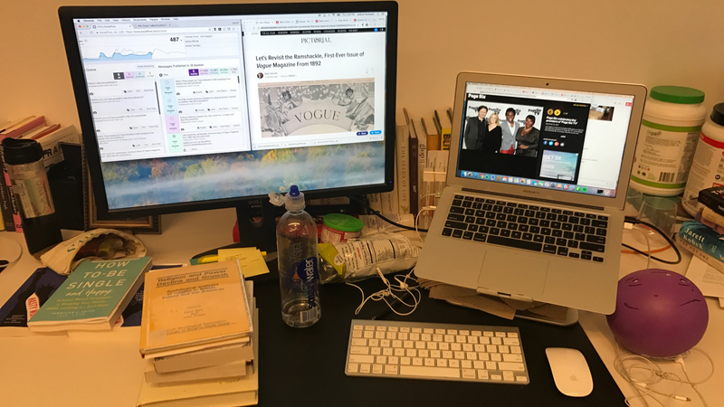 A desk covered in garbage shouts devotionals to God for the opportunity to serve her through blogging at the stylish Jezebel pod.